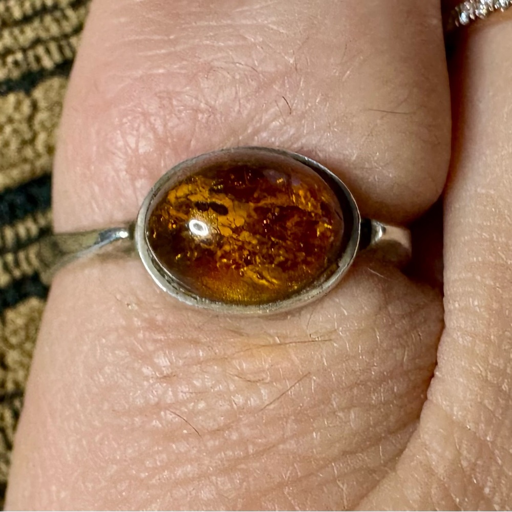 Starburst Amber in sterling silver ring.